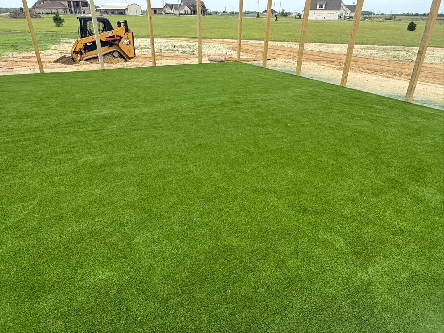 Turf base preparation showing proper grading and drainage substrate
